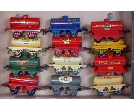 A large tray containing 12 pre war tank wagons including Castrol, 2x Shell, 'M' Shell, National Benzole, 2x BP, Esso, Red lin