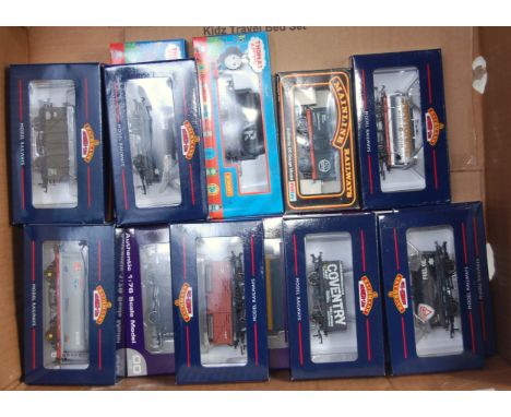 16 various boxed Bachmann, Dapol, Mainline, and Hornby boxed wagons and rolling stock, examples to include a Thomas the Tank 