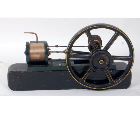 Horizontal steam engine comprising heavy wood plinth bearing single fixed cylinder of brass (2.5" Bore x 2 inch Stroke), driv