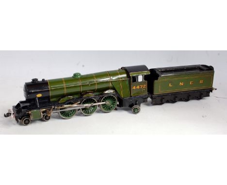 A Bassett Lowke LNER lined green 3-rail Flying Scotsman" engine and tender, touching into paintwork, some painting to black a