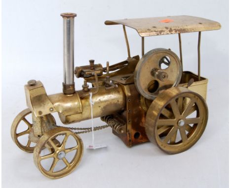 A Wilesco Old Smokey single cylinder traction engine, comprising brass and alloy body with wormlink steering, free running ex