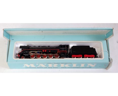 A Marklin 3-rail 3027 DB BR44 2-10-0 No. 44690 with 1958 version tender No. GN 809 (VG-BG), in blue picture box (G-BG)