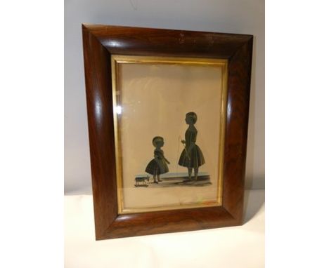 A Victorian silhouette with gilt detail depicting a young girl with pull along horse and a young girl holding a whip, inscrib