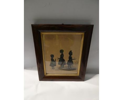 A Victorian silhouette with gilt detail depicting three children, one girl holding a doll, one girl holding a boat and one bo