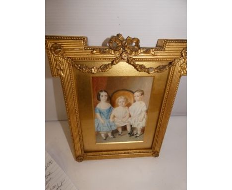 A good quality Victorian English watercolour depicting three siblings, one sister seated in gold upholstered chair and a whit