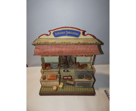 A good quality French wooden grocer's shop entitled "Epicerie Parisienne" with retractable awning, four drawers to top, gradu