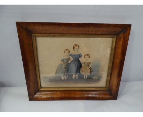 A Victorian watercolour depicting three young children, one with pulling along a toy horse on wheels, with figure sat on top,