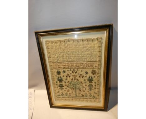 A Victorian sampler by Mary Sobys Holsworthy School Dec 8th 1851 with prayer and various motifs including angels, deer and tr