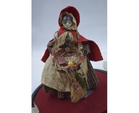 A 19th Century Grodnerthal Pedlar doll, painted wood with black painted hair with curls to the face, painted eyes and lips, r