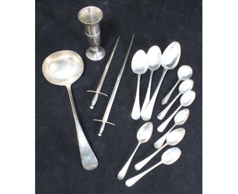 Eleven various silver spoons, 8.26 ozt, together with a silver spill vase, two silver-plated 'Sword' letter openers and a ser