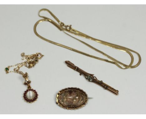 A fine 10k gold necklace chain (as found), set with small emeralds, with ruby, amethyst and cabochon moonstone pendant, 3.60g