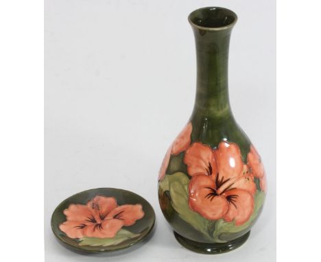 A Moorcroft 'Hibiscus' pattern vase with paper label and letter K stamp to base, approx. 27cm high, together with a matching 