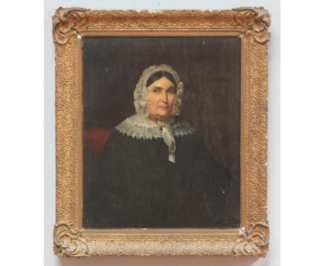 19th Century English School.  Half-length seated portrait of a middle-aged woman wearing black coat with white lace collar an