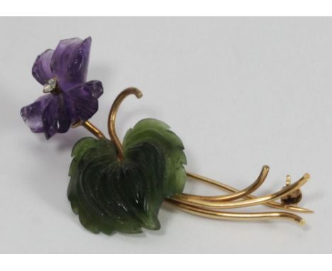 A 14ct (585) jade and diamond brooch modelled as a purple flower, 5cm long 