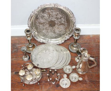 A quantity of silver plate including a circular salver, pair of candlesticks, four-piece egg cruet,  Dansk Designs six-light 