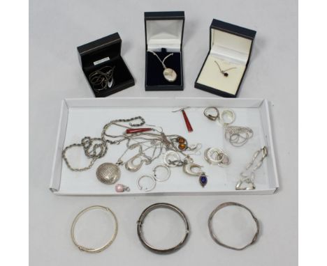 A quantity of silver jewellery including a pair of amber earrings, fine silver necklace with ruby coloured pendant, silver lo