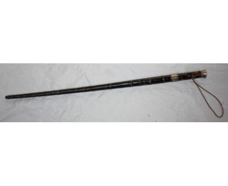 A sword stick with white metal collar and handle, black painted bamboo grip and triform blade, in black painted bamboo scabba