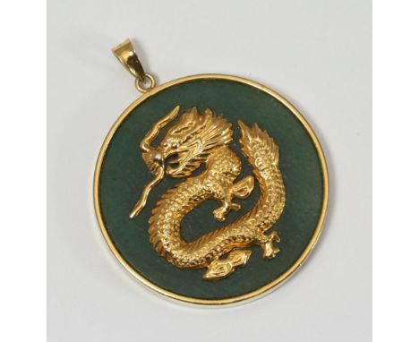 A 14ct gold-mounted circular jade dragon necklace pendant ,with dragon to obverse and Chinese character to the reverse, 40mm 