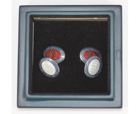 A pair of Fiona Rae silver and enamel cufflinks celebrating the Trafalgar Bi-Centenary, in original retail box and slip case 