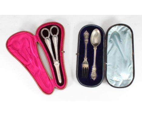 A pair of silver grape scissors, Sheffield, 1907, maker's mark of Thomas Bradbury &amp; Sons Ltd, in purple velvet lined case