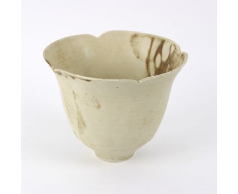 Attributed to Marianne De Trey (British 1913-2016), a studio porcelain vase of flared petal form, cream matt glaze with brown