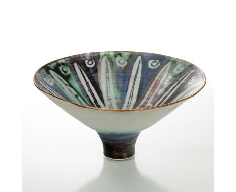 Marianne De Trey (British 1913-2016), a conical porcelain bowl on tapering foot, the interior with white flower and circular 