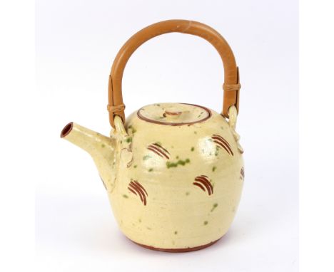 William 'Bill' Marshall (British 1923-2007), a St Ives pottery stoneware teapot and cover, cream cut through glaze dotted in 
