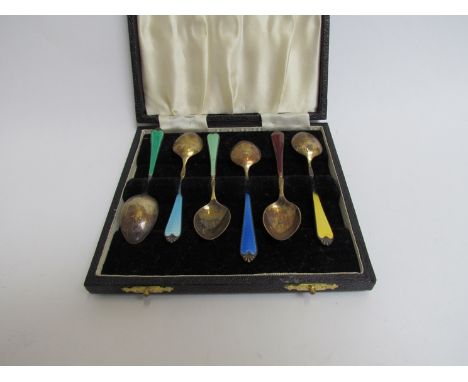 A set of Adie Brothers Ltd silver gilt multi-coloured enamel coffee spoons, boxed, Birmingham 1957-1958, 64g