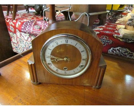 An Art Deco walnut mantel clock with Roman numeral dial, three train
