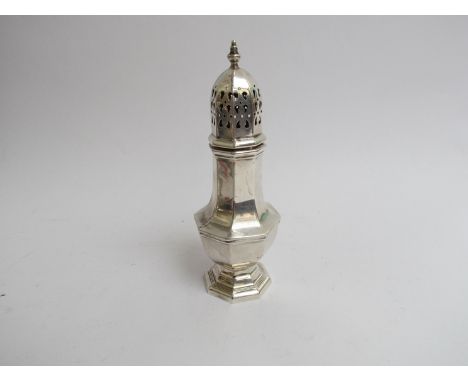 A Harrison Brothers and Howson Ltd silver sugar caster with finial top, faceted body, Birmingham 1989, 17.5cm tall, 138g