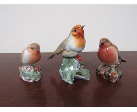 Three Robin figures including Beswick and Worcester 