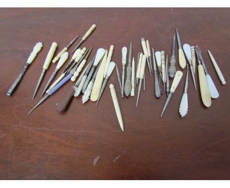 A quantity of button hooks