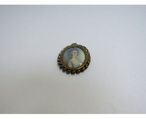 A miniature oval portrait of Constantine Weber, Mozarts wife in gilt frame with a porcelain scent bottle 