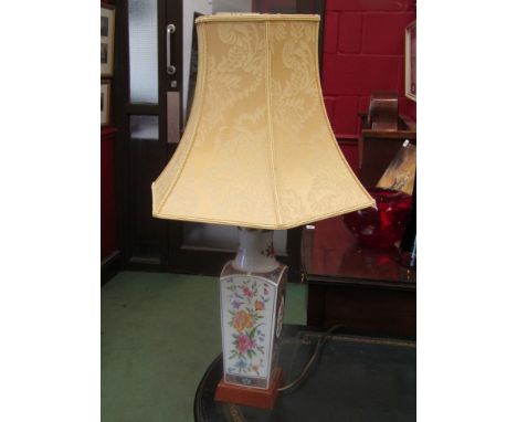 A Japanese ceramic lamp on mahogany base with shade, 67cm tall