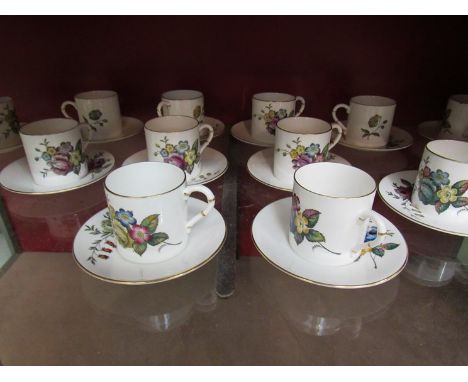 A quantity of Royal Worcester coffee cans and saucers, floral sprays, gilt edge
