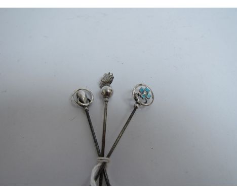 Three Charles Horner silver hatpins including Royal Fusiliers and blue enamel examples (3)