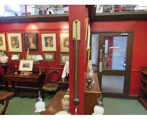 A mahogany stick barometer, the scale plate named ''Yates and Son, Opticians, Dublin'', 91cm long (a/f)