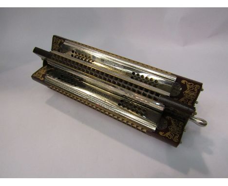 A Hohner paddle steamer harmonica 