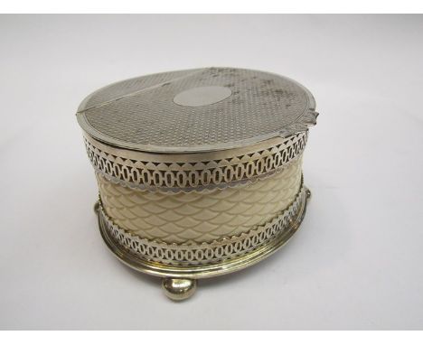 A late 19th Century plated tea caddy on  bun feet with carved ivory body 