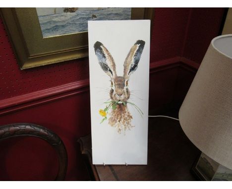 RYAN: Oil on board depicting a portrait of a hare holding a dandelion in its mouth, signed lower right, 51cm x 20cm