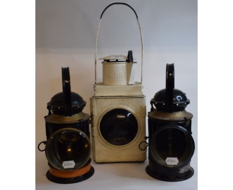 A British Rail paraffin lamp, the neck impressed BR, 51 cm high and a pair of B.R.(W) hand lamps, with makers stamps of Blado