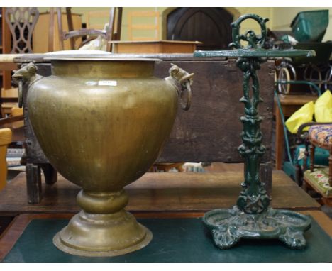 An 18th century oak six plank coffer, 88 cm wide, an Eastern brass planter, with elephant mask handles, and a cast iron stick