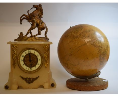 A Philips' 10 inch Challenge Globe, on an associated base, 25 cm diameter, a clock surmounted a man with a rearing horse, a p