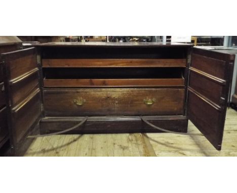 A 19th century mahogany folio style cabinet, having a pair of panel doors, 125 cm wide