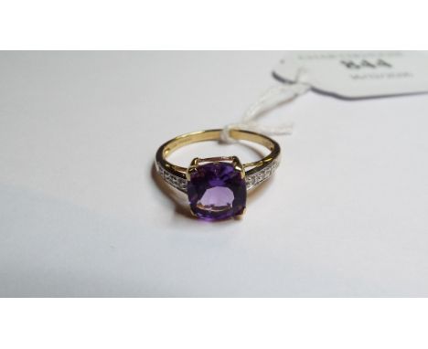 A 9ct gold, amethyst and diamond ring