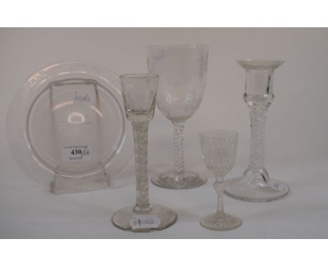 A 19th century wine glass, on a square lemon squeezer base, 12 cm high, an 18th century cordial glass, with a double cotton t