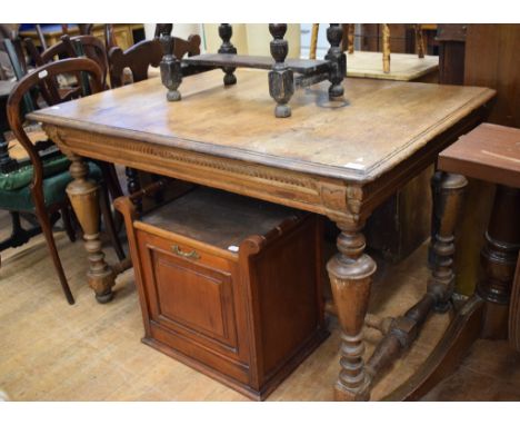 A 19th century oak dining table, on turned legs and stretchers, 123 cm long, an Edwardian piano stool, a carved oak chest, a 