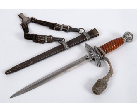 A German World War II Luftwaffe 2nd pattern dagger, the blade marked TIGER SOLINGEN, with a scabbard and hanger  See illustra