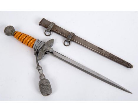 A German World War II Luftwaffe 2nd pattern dagger, the blade marked C Gustav Spitzer, Solingen, with a scabbard, and a hange
