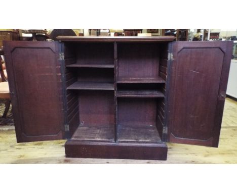 A 19th century mahogany folio style cabinet, having a pair of panel doors, 81 cm wide